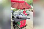 GEROBAK-GOSOK-Usaha-gerobak-gosok-pakaian-yang-dijalankan-Rizko-beserta-istri-di-Banjarmasin.jpg