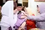 Nindy Ayunda dan Askara Parasady Gelar Acara Qiqahan