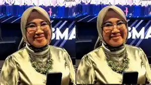 Elly-Agustina-Kepala-Sekolah-SMAN-1-Sungai-Tabuk.jpg