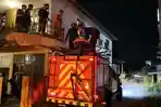 Sandra-tidak-bisa-dievakuasi-lewat-tangga-karena-terlalu-sempit-untuk-lewat-tandu.jpg