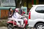 ilustrasi-orang-boti-naik-motor.jpg