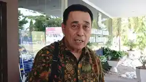 KASUS-PENIPUAN-Tersangka-Husen-Hasni-saat-diwawancarai-TribunGorontalocom.jpg