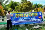 Satlantas-Aceh-Timur-memasang-spanduk-pemberitahuan-Operasi-Patuh-Seulawah.jpg