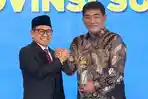 YSK-Gubernur-Sulawesi-Utara-Yulius-Selvanus-Komaling-YSK-menerima-penghargaanLO0.jpg