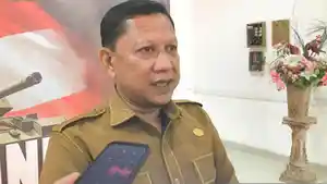 WARIA-DI-GORONTALO-Kepala-Badan-Kesatuan-Bangsa-dan-Politik-Kesbangpol-Kabupaten-Gorontalo.jpg