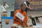 Tersangka-M-Ecky-Listiantho-saat-rekonstruksi-kasus-mutilasi.jpg