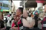 Viral-video-seorang-mahasiswi-di-Jakarta-Timur-gigit-anggota-kepolisian.jpg