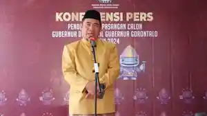 Plt-Ketua-KPU-Provinsi-Gorontalo-Risan-Pakaya-saat-konferensi-pers-Selasa-2782024.jpg