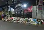 Tumpukan-sampah-yang-berserakan-didekat-simpang-Kebun-Lada-Kota-Binjai_.jpg