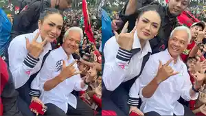 Ganjar-Pranowo-dan-Krisdayanti-pose-bareng-dengan-salam-metal-natizen-sebut-Prabowo-Gibran.jpg