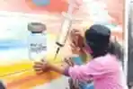 Lukisan Mural Covid-19 di Tembok Pembatas Kampung