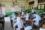 Hari Pertama Pelaksanaan Tes Kemampuan Akademik Kelas 6 MIN 34 Aceh Besar Berjalan Sukses dan Lancar