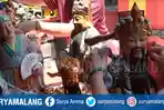 bersihkan-rupang-imlek-malang.jpg