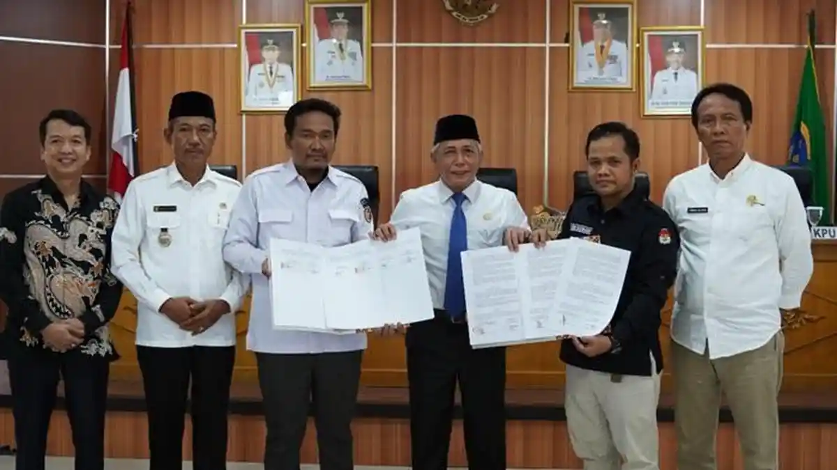 Pemkab OKI, KPU dan Bawaslu Tandatangani NPHD Pemilu 2024