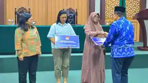 LPSK-menyerahkan-kompensasi-kepada-korban-terorisme-di-Sulawesi-Tengah.jpg