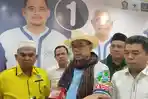 Ketua-tim-pemenangan-Bobby-dan-Surya-Hinca-Panjaitan-tengah-saat-diwawancarai_1.jpg