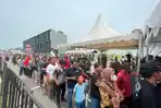 MENGULAR-Antrean-panjang-terjadi-di-lokasi-tempat.jpg