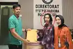 2026-03-16-Irma-Tendengan-saat-melapor-di-Polda-Sulsel.jpg