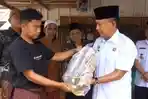 Wabup Merangin Abdul Khafidh Serahkan Bantuan untuk Korban Kebakaran di Desa Seling Tabir