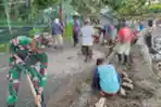 Satgas Yonarmed 1 Kostrad Bangun Talud Jalan Sepanjang Pesisir Pantai