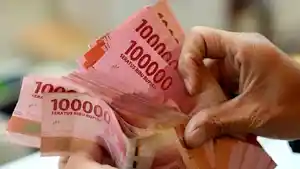 ilustrasi-rupiah-yang-sedang-dihitung-tangan.jpg