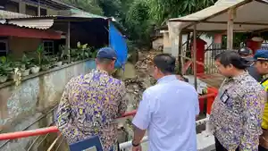 4-Tanggul-Jebol-dan-Jalan-Amblas-Akibat-Banjir-di-Kendari-Bakal-Diperbaiki-Pemprov-Sulawesi-Tenggara.jpg