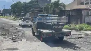 JALAN-RUSAK-Titik-Jalan-Rusak-di-Ruas-46-atau-SH-Sarundajang-Kota-Bitung-Sulut.jpg