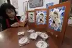 Elina Farida Penjual Souvenir Maskot PON XIX/2016
