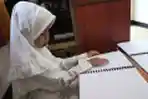 Anak-anak Penyandang Disabilitas Belajar Al Quran