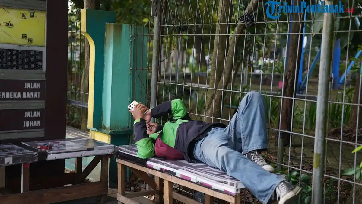 Berita Foto - Mulai 1 Juli 2026, Potongan Komisi Gojek dan Grab Resmi Jadi 8 Persen - Tribunpontianak.co.id