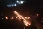 Aksi-nyalakan-lilin-di-Aralle-Mamasa-mengenang-kasus-pembunuhan-pasutri-belum-terungkap.jpg
