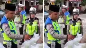 VIRAL-Polisi-Berseragam-Bagi-bagi-Takjil-Tapi-Sepi-Peminat-Dikira-Razia-tak-Ada-yang-Mau-Lewat.jpg