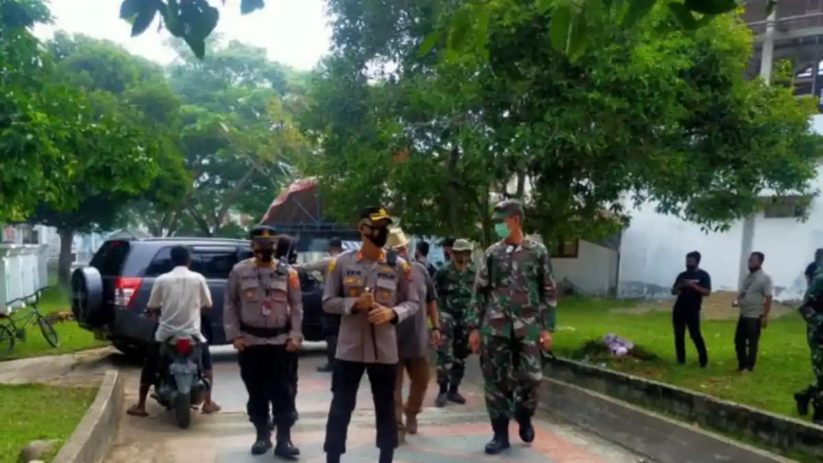 Kodim Aceh Utara dan Polres Lhokseumawe Bersihkan Makam Malikussaleh