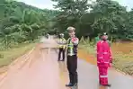 Jalan-Trans-Sulawesi-di-Konawe-Utara-Sempat-Putus-Akibat-Banjir-Kini-Sudah-Bisa-Dilalui-Kendaraan.jpg