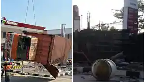 KECELAKAAN-HARI-INI-Proses-evakuasi-truk-boks-yang-mengalami-kecelakaan-di-area-SPBU-Silayur.jpg