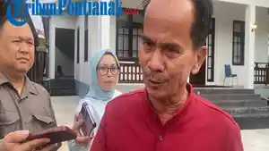 kondisi-jalan-yang-rusak-parah-di-wilayah-tersebut.jpg