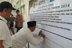 Sejumlah-kepala-desa-saat-menandatangani-Ikrars.jpg