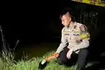 OLAH-TKP-Polisi-saat-melakukan-olah-TKP-di-kubangan-air-di-Desa-Beton.jpg