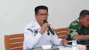 Kepala-Dinas-Ketenagakerjaan-Kota-Pematangsiantar-Robert-Samosir-TRIBUN-MEDAN-HO.jpg
