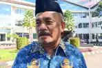 Kepala-Dinas-Koperasi-dan-UMKM-Papua-Barat-Enos-Aronggear-kg.jpg