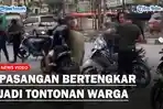 Pertengkaran-pasangan-di-pinggir-jalan-malah-jadi-tontonan-warga.jpg