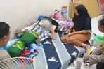 Petaka Serbuk Mercon di Driyorejo Gresik: Dua Anak Luka Bakar Usai Injak Tumpahan Petasan