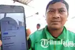 Driver-ojol-di-Kota-Blitar-menunjukkan-tarif-baru-untuk-orderan-penumpang-tarif-ojol-naik.jpg