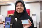 Warga-sedang-mengurus-administrasi-kependudukan-di-Disdukcapil-Deli-Serdang.jpg