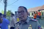 Plt-Kasatpol-PP-Kota-Bogor-Pupung-W-Purnama-saat-dijumpai-di-Kayu-Manis.jpg