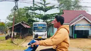 Tampak-Bus-Damri-tengah-parkir-di-Pool-Damri-yang-berada-di-Jalan-Perintis.jpg