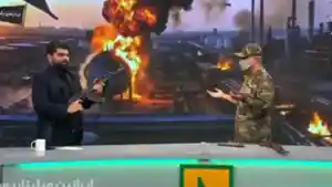 Televisi-Iran-Siarkan-Tutorial-Gunakan-Senjata-AK-ke-Warga-Militer-Buka-Kios-Pelatihan-di-Desa-desa.jpg