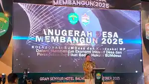 20251028_Kepala-DPMD-Kaltim-Puguh-Harianto-dalam-Anugerah-Desa-Membangun-2025.jpg