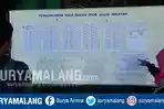 warga-kota-malang-melihat-papan-pengumuman-ppdb-jalur-wilayah-di-smpn-6_20180705_163438.jpg