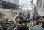 PEMADAMAN-Proses-pemadaman-api-yang-membakar-bangunan.jpg